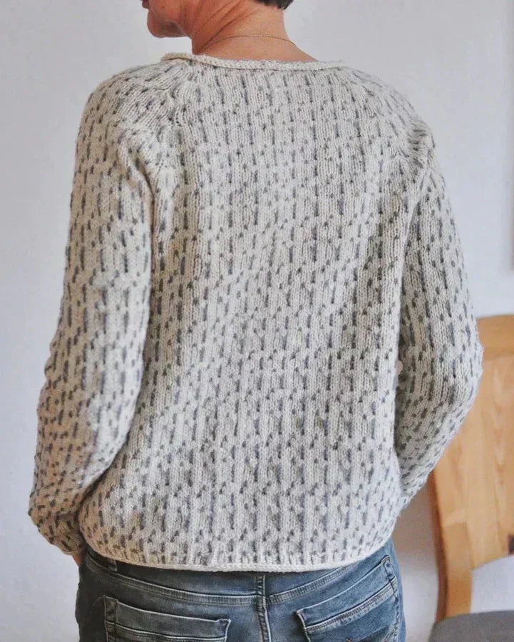 Womens knit pullover with crew neckline and allover speckled texture, long sleeves