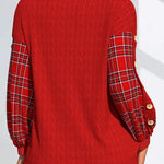 Red pullover sweater back view with plaid puff sleeves and buttoned cuffs