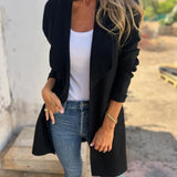 Long open-front revers cardigan in black knit with draped lapels and pockets