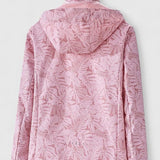 Light pink hooded jacket with back view of hood and leaf-patterned fabric