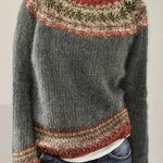 Womens knit pullover with crew neck, long sleeves, multicolor patterned yoke and hem trim