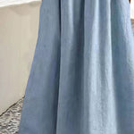 Light blue gathered midi skirt with pleated flare and straight hem