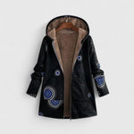 Black hooded parka jacket with blue circular print, front zipper, warm lined hood.