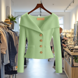 Light green ribbed knit button-front top with long sleeves and peplum hem