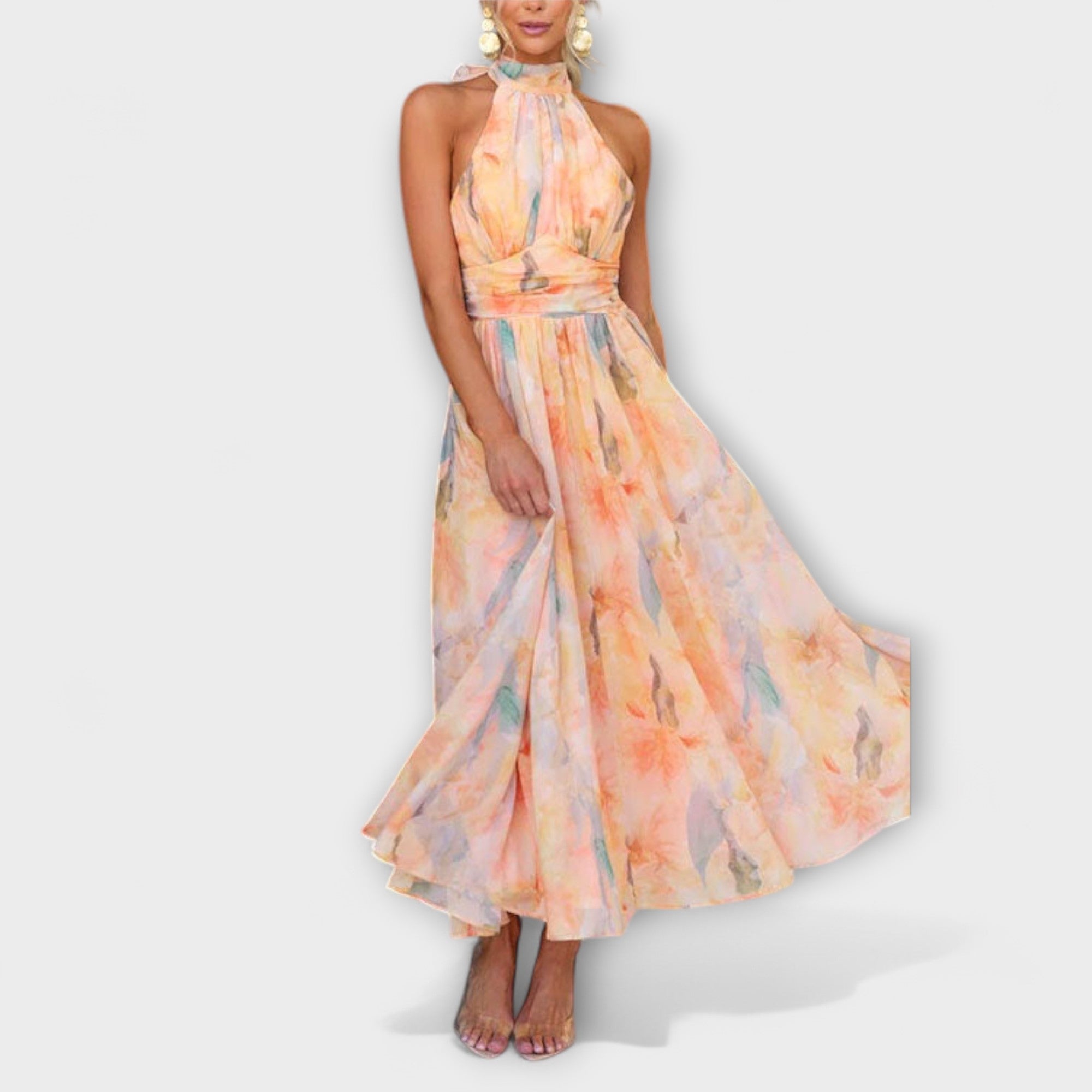 Halter maxi dress with flowing skirt in pastel watercolor orange and blue pattern