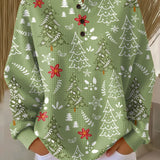 Green crewneck pullover with Christmas tree print, snowflakes, and red bows