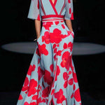 Maxi dress, light blue with red floral, V-neck and red sash, short sleeves, front slit
