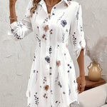 White floral button-front shirt dress with collar and long sleeves