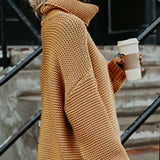 Orange roll-neck knitted sweater with long sleeves and cozy ribbed cuffs.