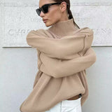 Camel knit turtleneck sweater with chunky ribbed collar and long sleeves