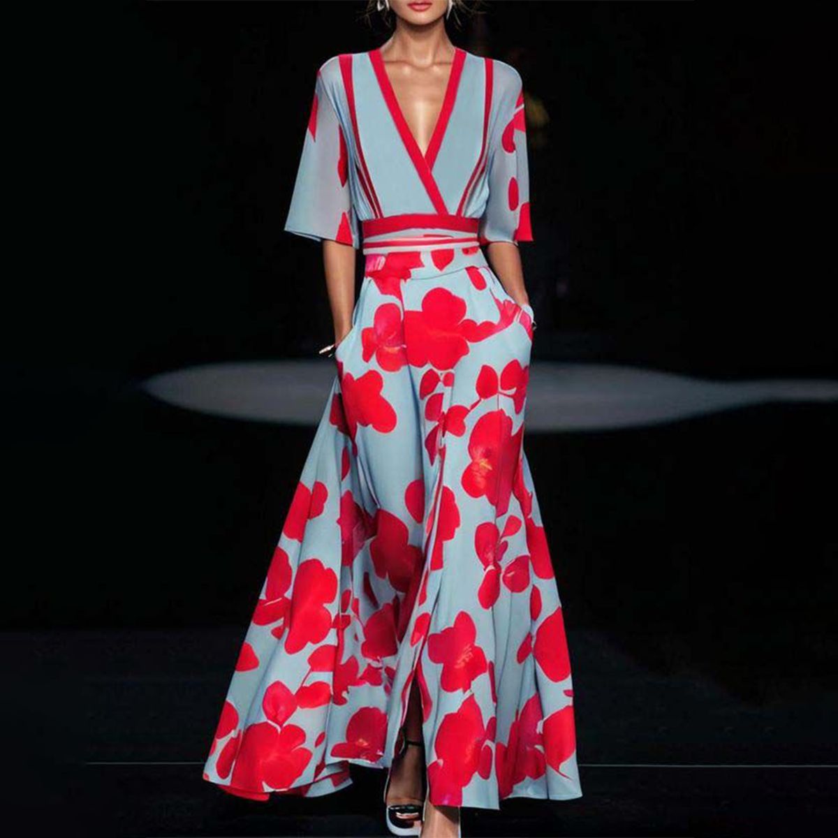 Light blue V-neck maxi dress with bold red floral print, red trim, short sleeves