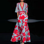 Light blue V-neck maxi dress with bold red floral print, red trim, short sleeves