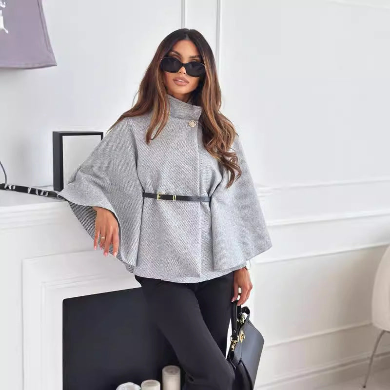 Gray belt jacket with button collar, wide cape sleeves, and cinched waist belt