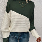 Dark green and white color-block pullover sweater with long sleeves and crew neck