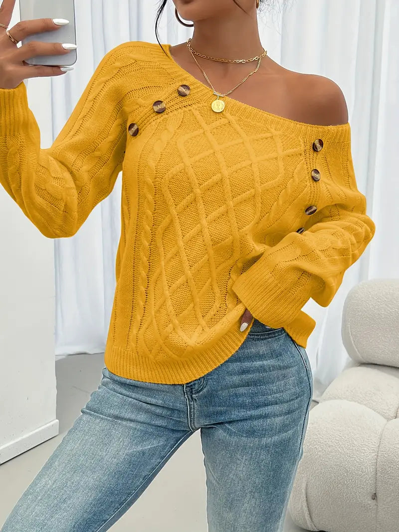 Cable-knit long-sleeve sweater, mustard yellow, one-shoulder drape with gold button at neckline