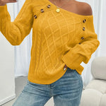 Cable-knit long-sleeve sweater, mustard yellow, one-shoulder drape with gold button at neckline
