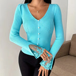 Turquoise ribbed V-neck button top with lace-trim cuffs