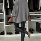 Gray knit pullover with relaxed silhouette and round neckline