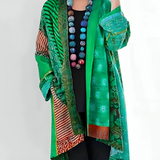 Multicolor knit cardigan with open front and long sleeves, bright green and teal patchwork