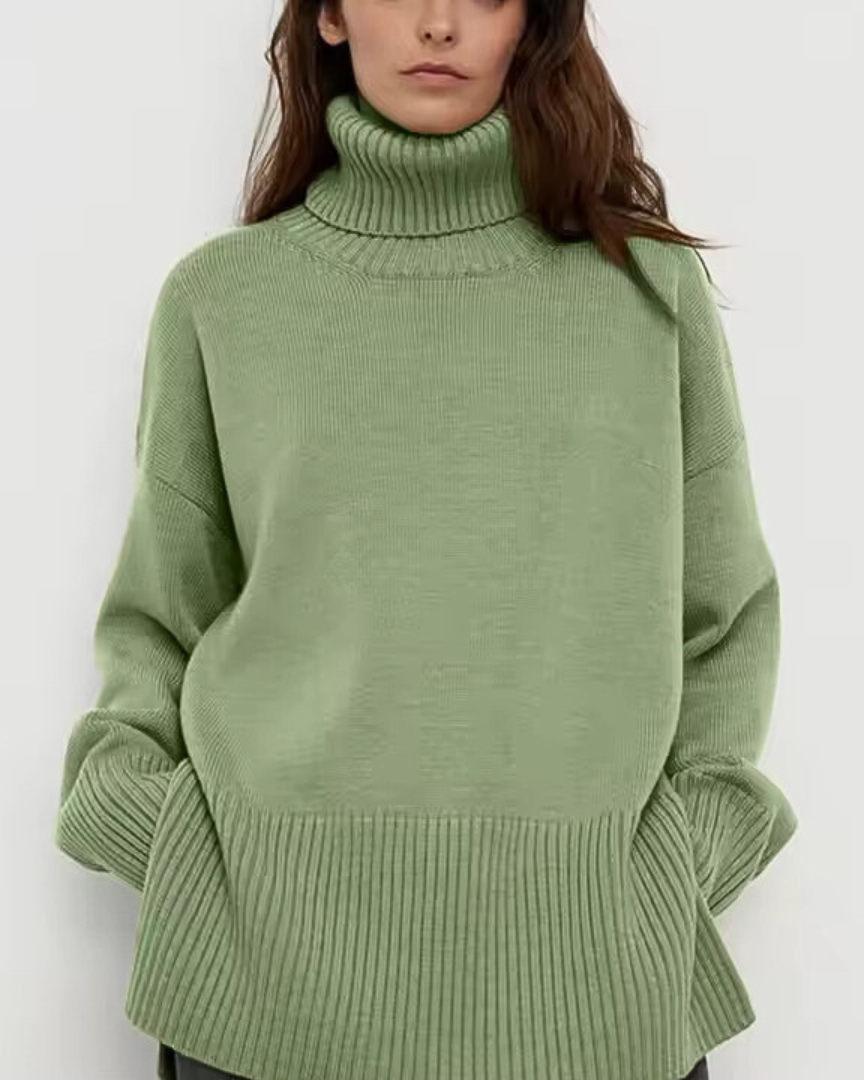 Light green turtleneck sweater with long sleeves and ribbed hem
