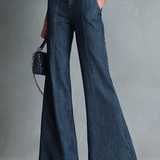 Dunkelblauer, ärmelloser Jumpsuit im Retro-Stil für Damen mit Stehkragen, ausgestelltem Schnitt und Reißverschluss vorne.