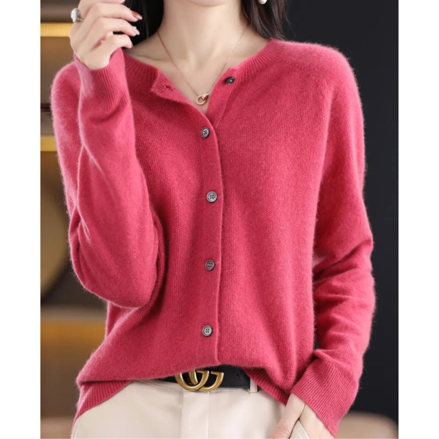 Fuchsia button-front knit pullover with long sleeves and crew neck