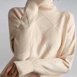 Beige ribbed turtleneck sweater with diamond knit panels and long sleeves