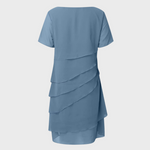 Light blue layered chiffon dress back view with short sleeves and cascading tiers