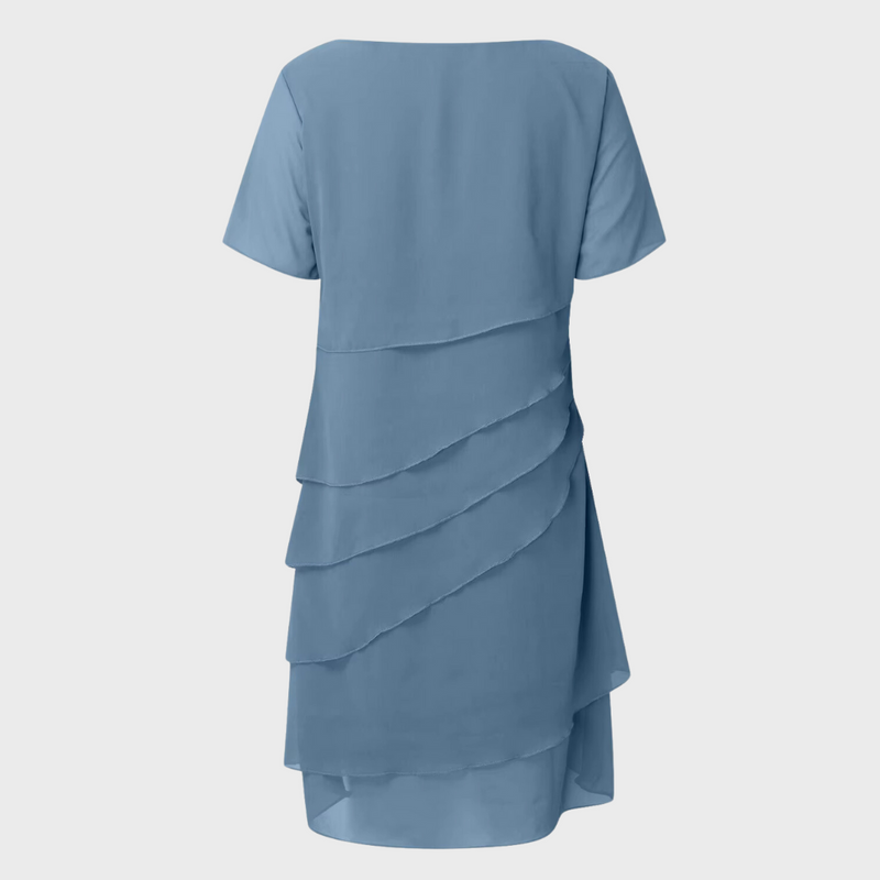 Light blue layered chiffon dress back view with short sleeves and cascading tiers