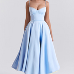 Light blue fitted corset-style slimming dress with spaghetti straps and flared midi skirt