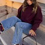 Burgundy knit turtleneck sweater with long sleeves