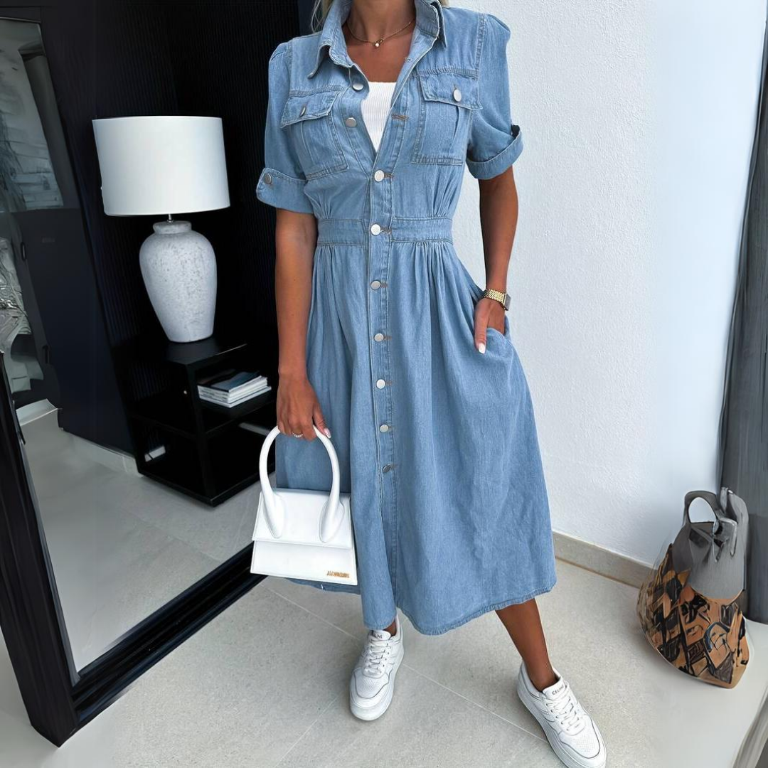 Light blue denim midi dress with collared neck, button front, and short sleeves