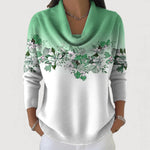 Women's cowl-neck pullover with mint green knit and floral chest print, long sleeves