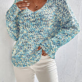 Loose knit pullover sweater with long sleeves, blue-and-white speckled texture