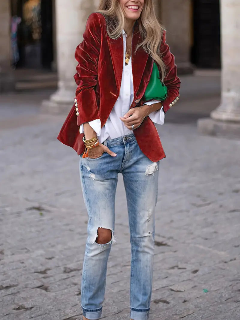 Red velvet blazer with notch lapels, gold button front, long sleeves, flap pockets