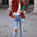 Red velvet blazer with notch lapels, gold button front, long sleeves, flap pockets