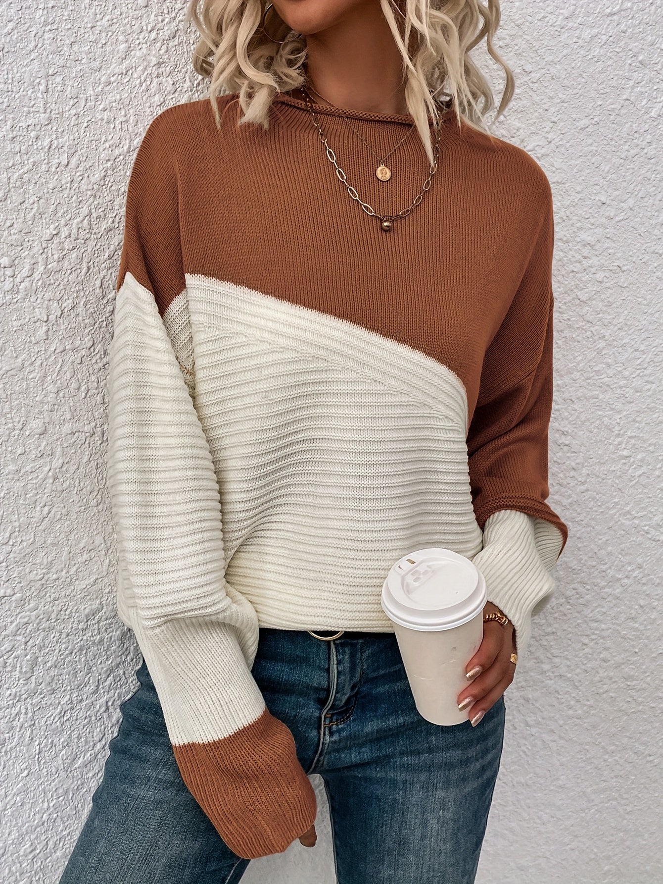Rust brown and white color-block pullover sweater with long sleeves and crew neck