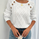 White cable-knit crewneck sweater with decorative shoulder buttons and ribbed cuffs
