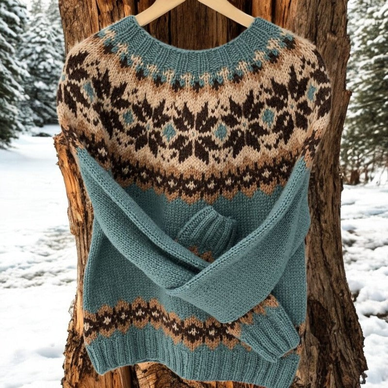 Teal knit pullover with crew neck and multicolor fair isle pattern, long sleeves