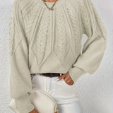 Cream cable-knit long-sleeve pullover with half-zip neckline and ribbed cuffs