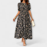 Amelia - Kleid mit Rundhalsausschnitt und floralem Muster