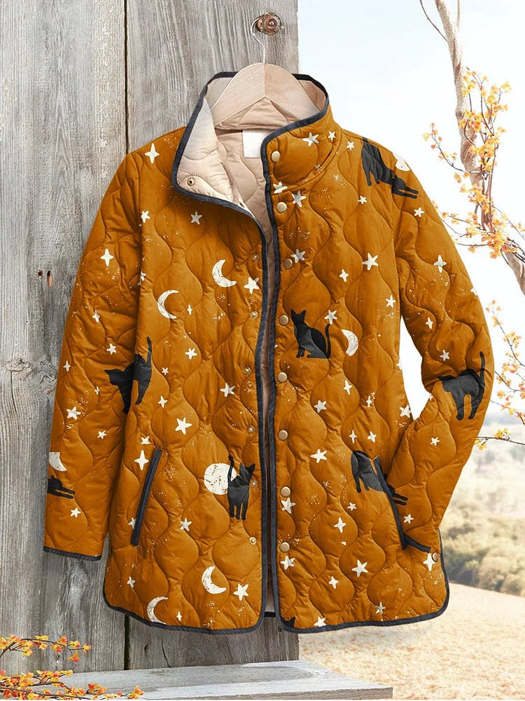 Orange Halloween quilted jacket with cat print, stars, and full zipper front