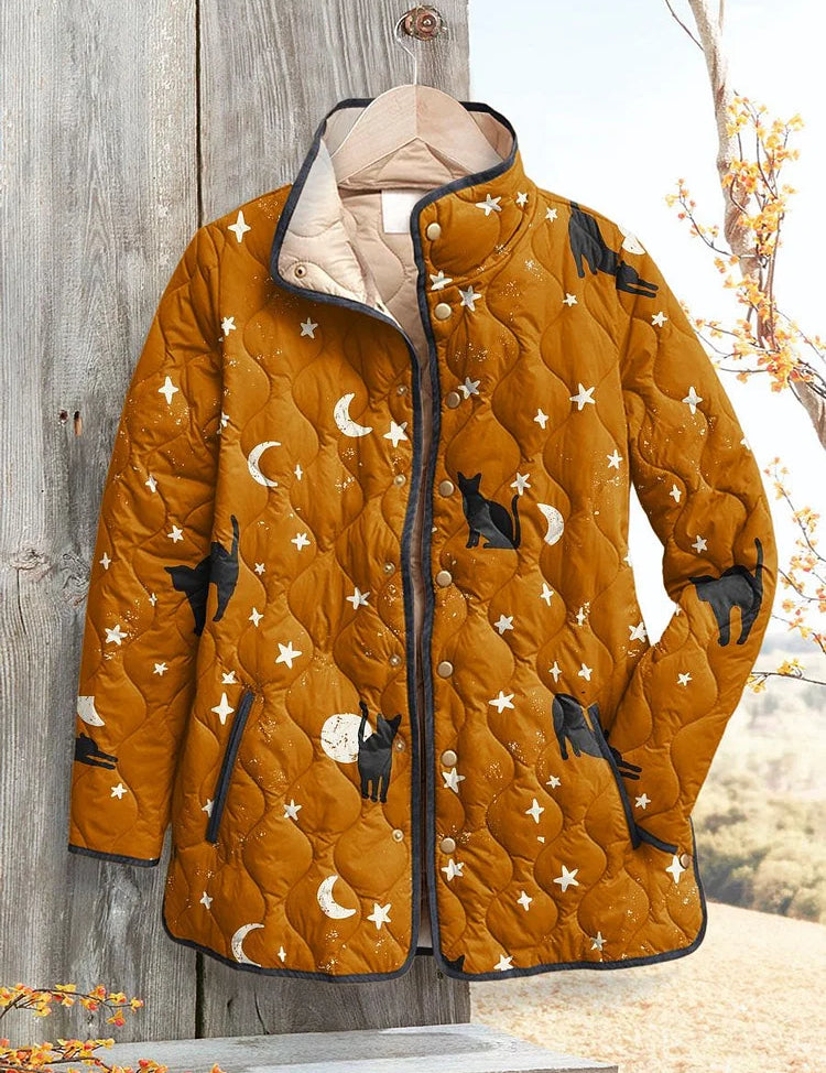 Orange Halloween quilted jacket with cat print, stars, and full zipper front