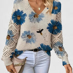 Relaxed floral pullover sweater, cream knit with blue flower print, V-neck, long sleeves