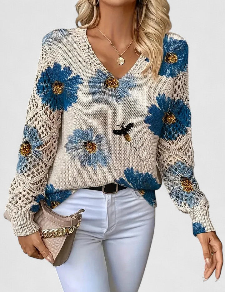 Relaxed floral pullover sweater, cream knit with blue flower print, V-neck, long sleeves