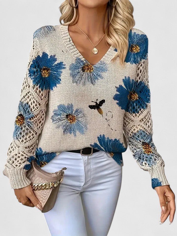 Relaxed floral pullover sweater, cream knit with blue flower print, V-neck, long sleeves