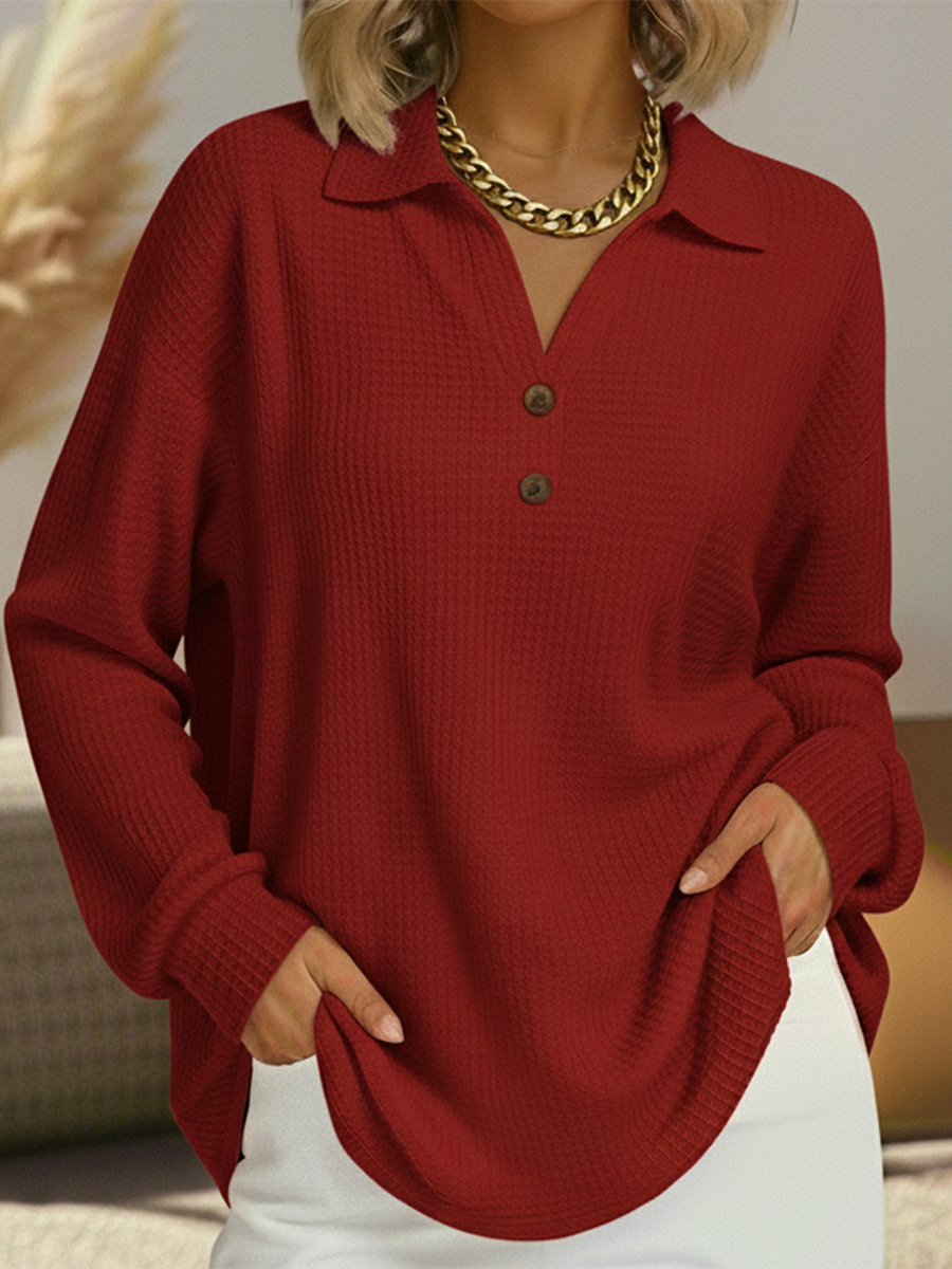 Red long-sleeve henley pullover with button placket and collar