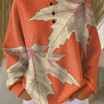 Maja™ warm pullover sweatshirt with orange leaf print, crew neckline, buttoned placket