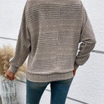 Khaki striped knit pullover with batwing sleeves, ribbed cuffs and hem