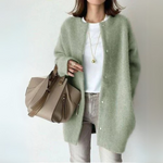 Green open-front cardigan with long sleeves and snap-button placket